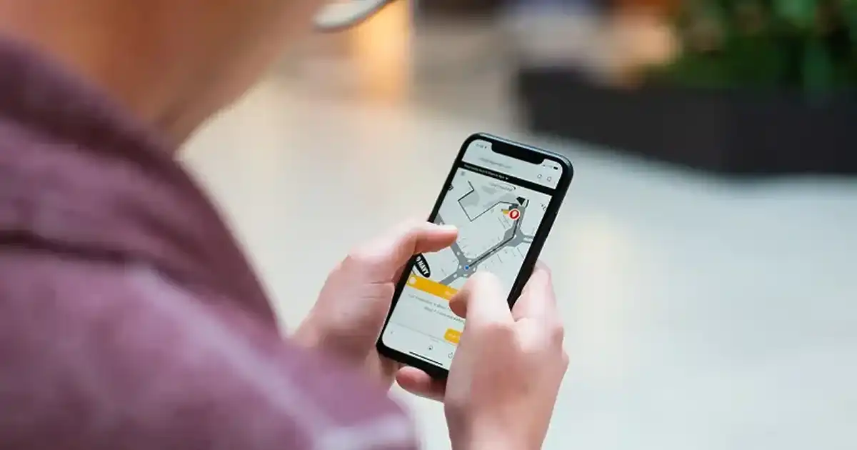 Guy using map on his phone